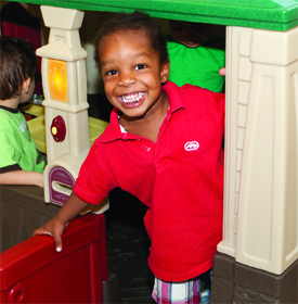 Child in playhouse